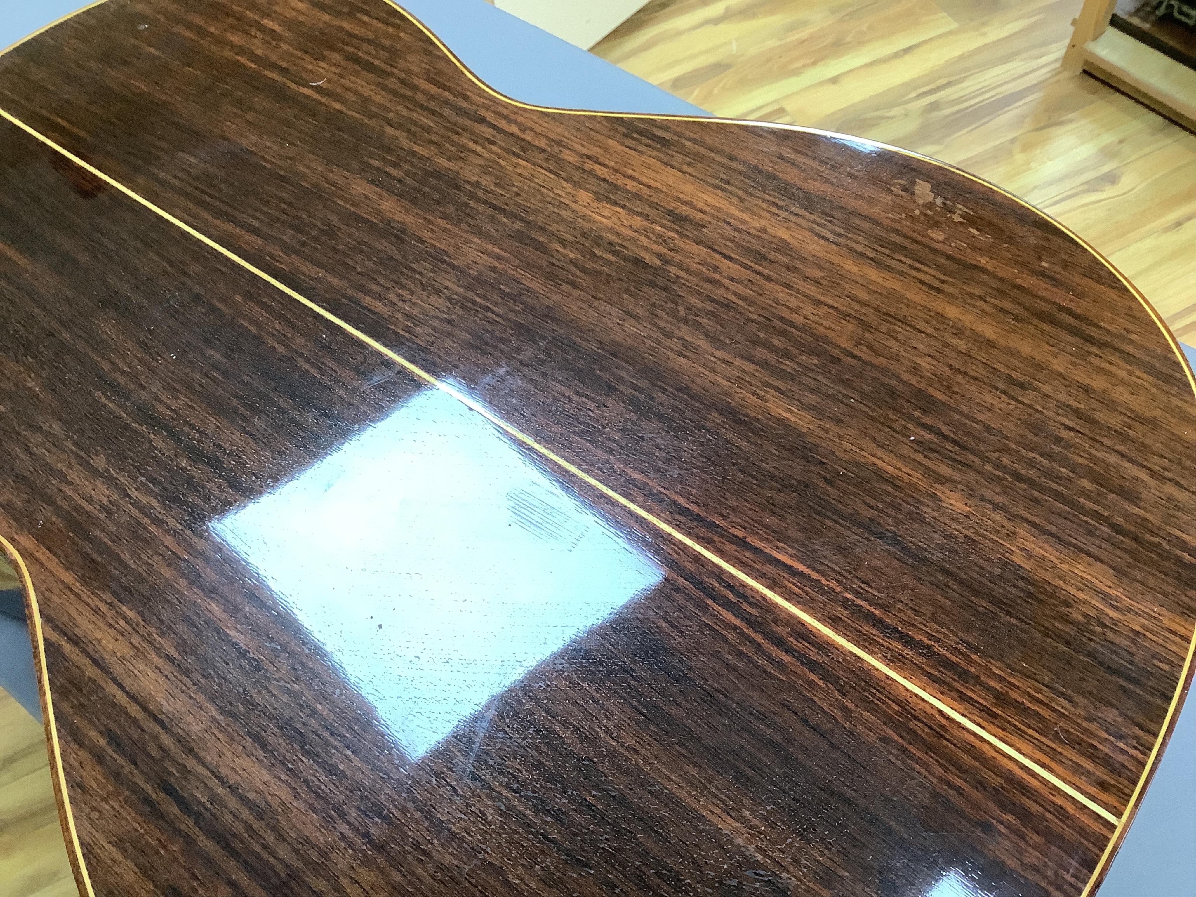 A Spanish Manuel Contreras classical guitar, with cedar front, Indian rosewood back sides and ebony fingerboard, with makers label inside body; M.G. Contreras, Madrid, back 49cm